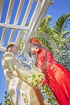 Couple wearing Vietnamese Ao Dai photo