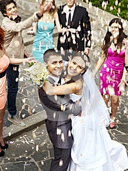 Couple at wedding outdoor.