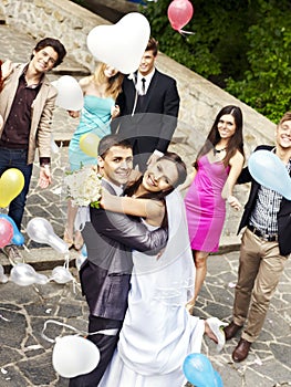 Couple at wedding outdoor.