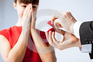 Couple with wedding ring and gift box