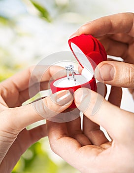 Couple with wedding ring and gift box