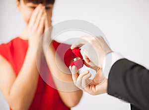 Couple with wedding ring and gift box