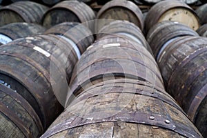 A couple of whisky barrels in a distillery
