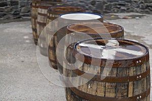 A couple of whisky barrels in a distillery