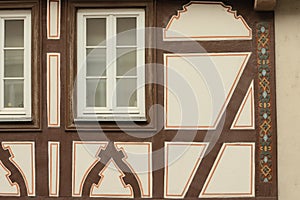 A couple of windows in an half timbered house facade Bacharach