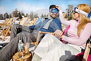 Couple on winter holiday in mountain