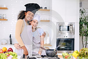 couple woman lover LGBT friend living with love care cooking at home holiday activity together