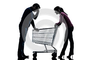Couple woman man sad with empty shopping cart silhouette