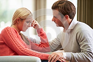 Couple With Woman Suffering From Depression