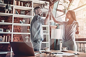 Couple working in cafe