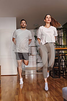 Couple working out together at home