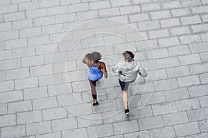 Couple working out together running outdoor