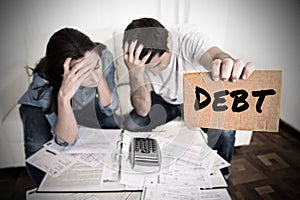 Couple worried need help in stress at home couch accounting debt bills bank papers expenses and payments