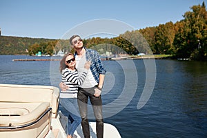 Couple on Yacht. vacation on Boat man and woman. Sailing Sea