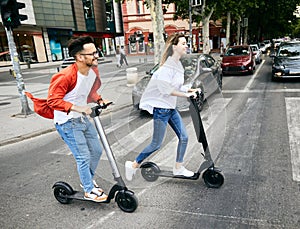 couple young electric scooter city transport riding technology lifestylestreet friend driving modern