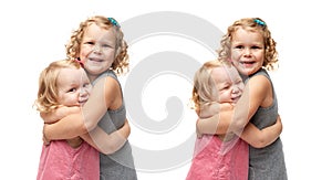 Couple of young little girls standing over isolated white background