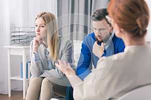 Couple of young people on marriage therapy