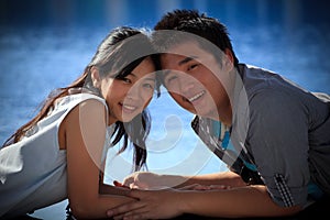 Couples of asian man and woman at water pool photo