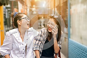 Couples of asian woman laughing with happiness emotion