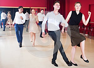 Couples enjoying active boogie-woogie