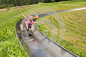 Couples Enjoying Alpine Coaster Luge