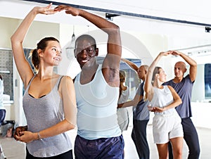 Couples enjoying dances in studio