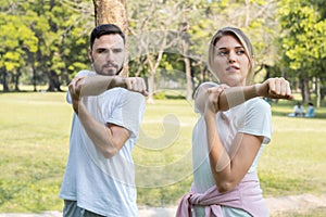 Couples are exercising in the park