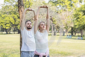 Couples are exercising in the park