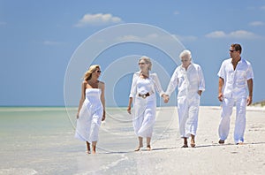 Couples Generations Family Walking Tropical Beach