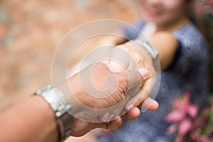 Couples holding hands