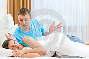 Couples quarrel in bed