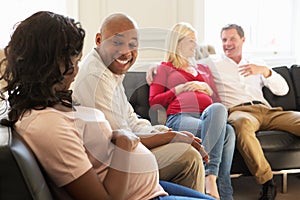 Couples In Waiting Room Of Ante Natal Clinic