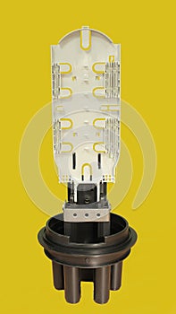 Coupling for connecting optical communication cables.