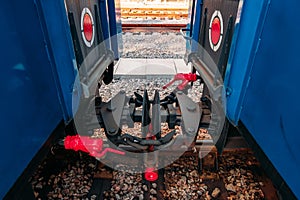 Coupling between two train carriages in narrow-gauge railway