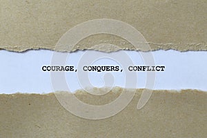 courage conquers conflict on white paper