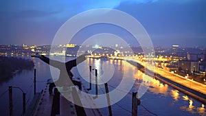 Courageous athlete making headstand on the edge of bridge, adrenaline and sports