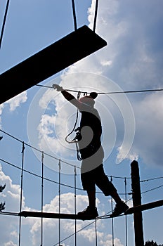 Courageous boy at rope park