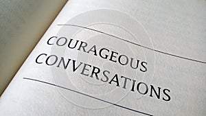 Courageous conversation printed on a book