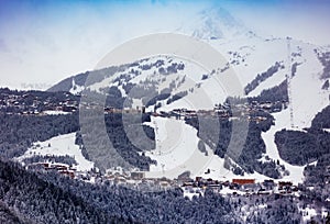 Courchevel ski resort slopes and village at winter