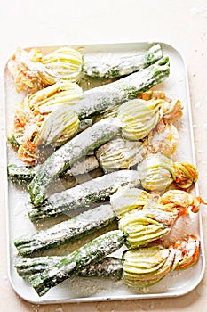 Courgette flowers stuffed with ricotta and coated in flour