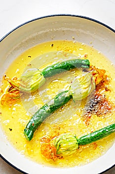 Courgette flowers stuffed with ricotta and fried