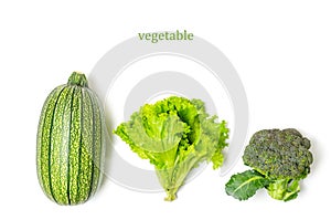 Courgettes, broccoli and salad on white background.Green, healthy vegetables with vitamins.