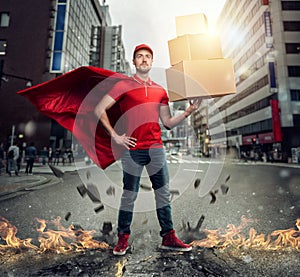 Courier acts like a powerful superhero in a city with skyscrapers. Concept of success and guarantee on shipment photo