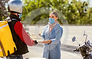 Courier Delivering Package To Customer Girl Standing Outdoors, Wearing Masks