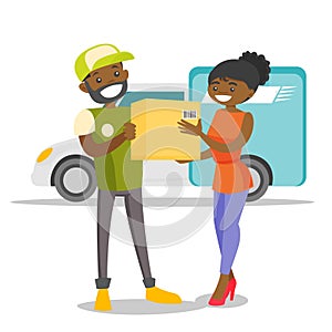 A courier delivering a package to a woman.