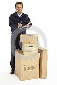 Courier Delivering Parcels Holding Clipboard