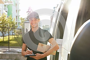 Courier Delivery Service. Man With Box Near Car Outdoors