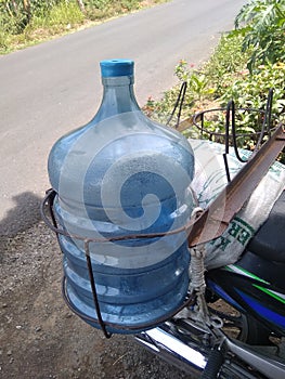 Courier gallons of mineral water