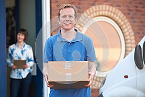 Courier Making Delivery To Client Office