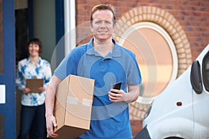 Courier Making Delivery To Client Office